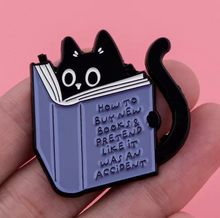 Black Cat Buying Books By Accident Enamel Pin